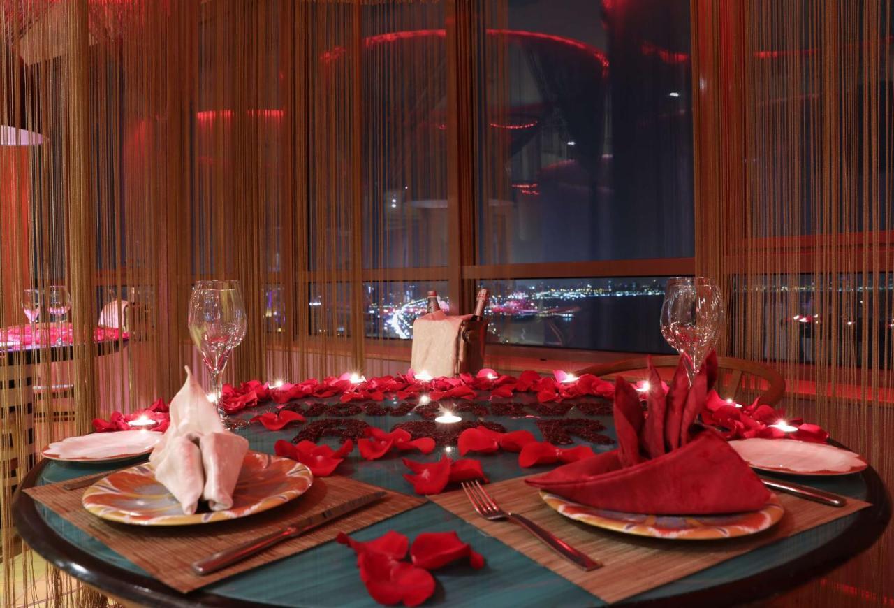 Symphony Style Hotel Kuwait Salmiya المظهر الخارجي الصورة A table set for a romantic dinner